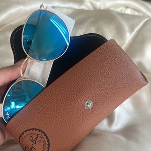 New (december 7th purchase unopened ) RAY BANS gold with blue lenses
